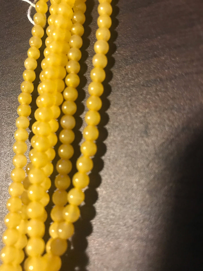 DRK143, Druk Bead, 4mm, Sun Yellow, 16in strand