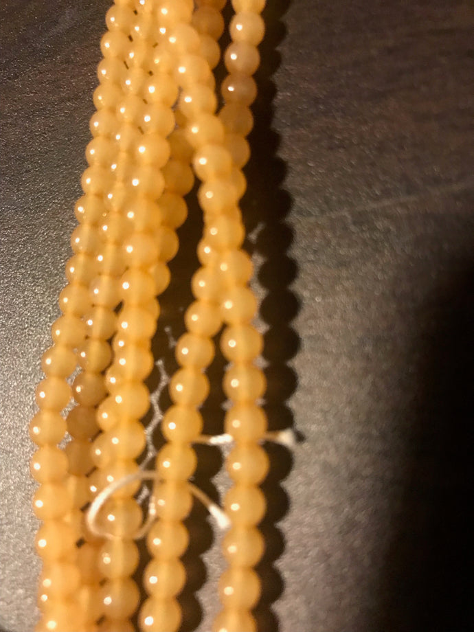 DRK147, Druk Bead, 4mm, Light Orange, 16in strand