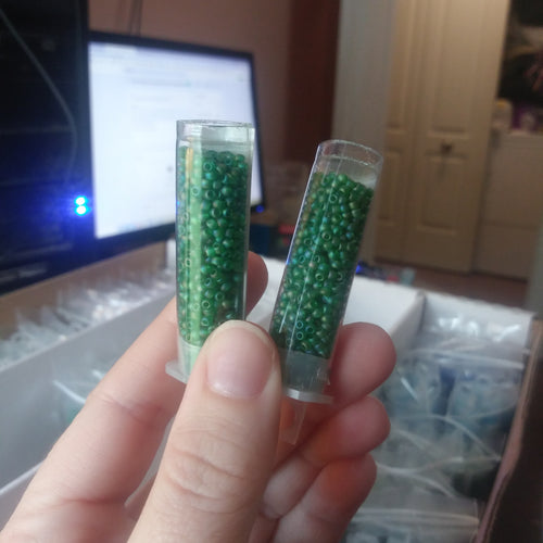 11T167BF TOHO 11/o Round Seed bead, Silver Lined Crystal Green